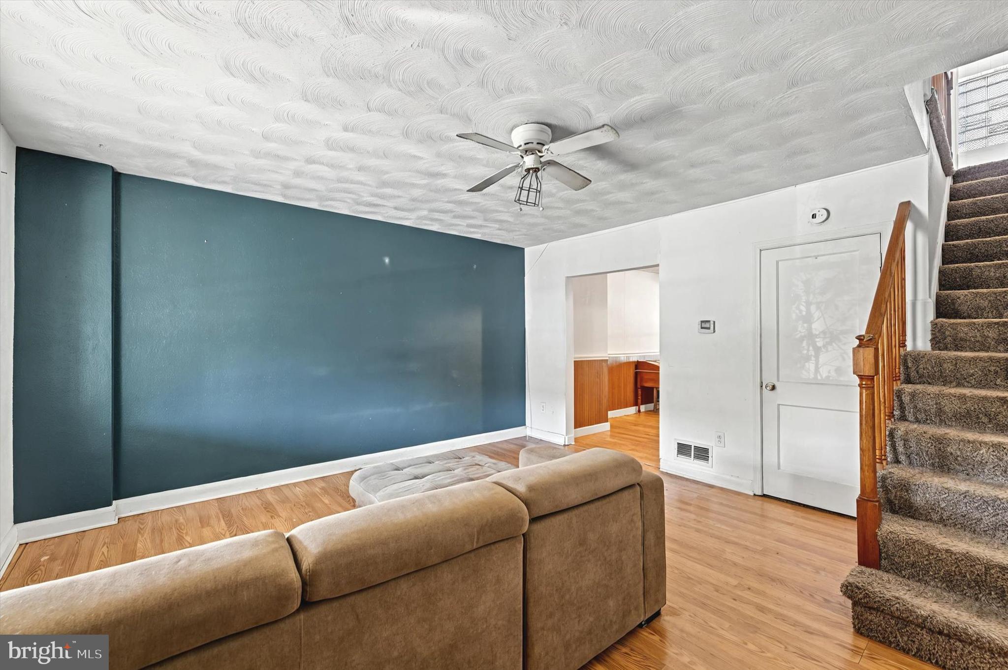 2161 Vailthorn Road Middle River, MD 21220 - Photo 4 of 18 a bedroom with a bed and wooden floor