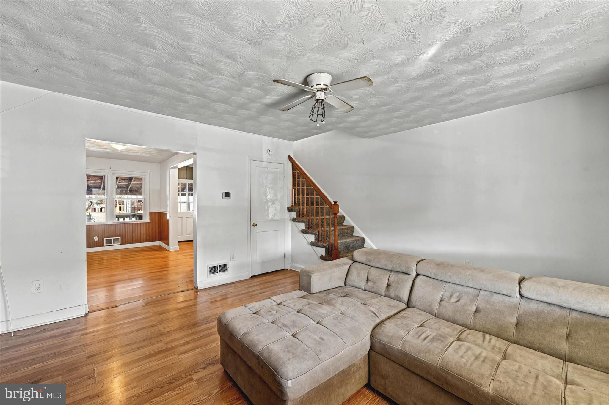 2161 Vailthorn Road Middle River, MD 21220 - Photo 5 of 18 a living room with furniture and wooden floor