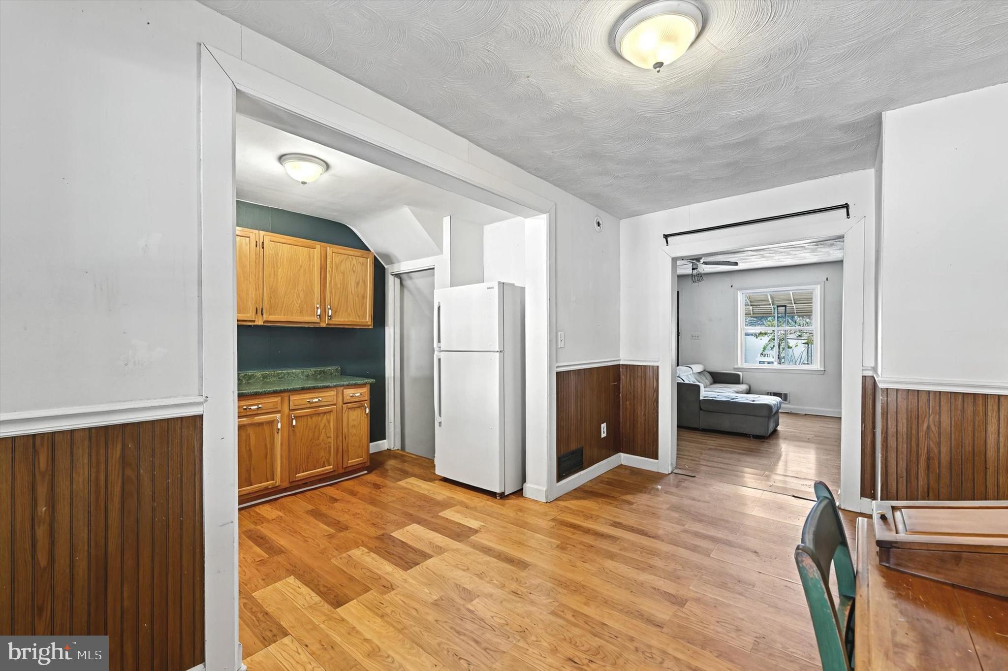 2161 Vailthorn Road Middle River, MD 21220 - Photo 7 of 18 view of living room with furniture and a window
