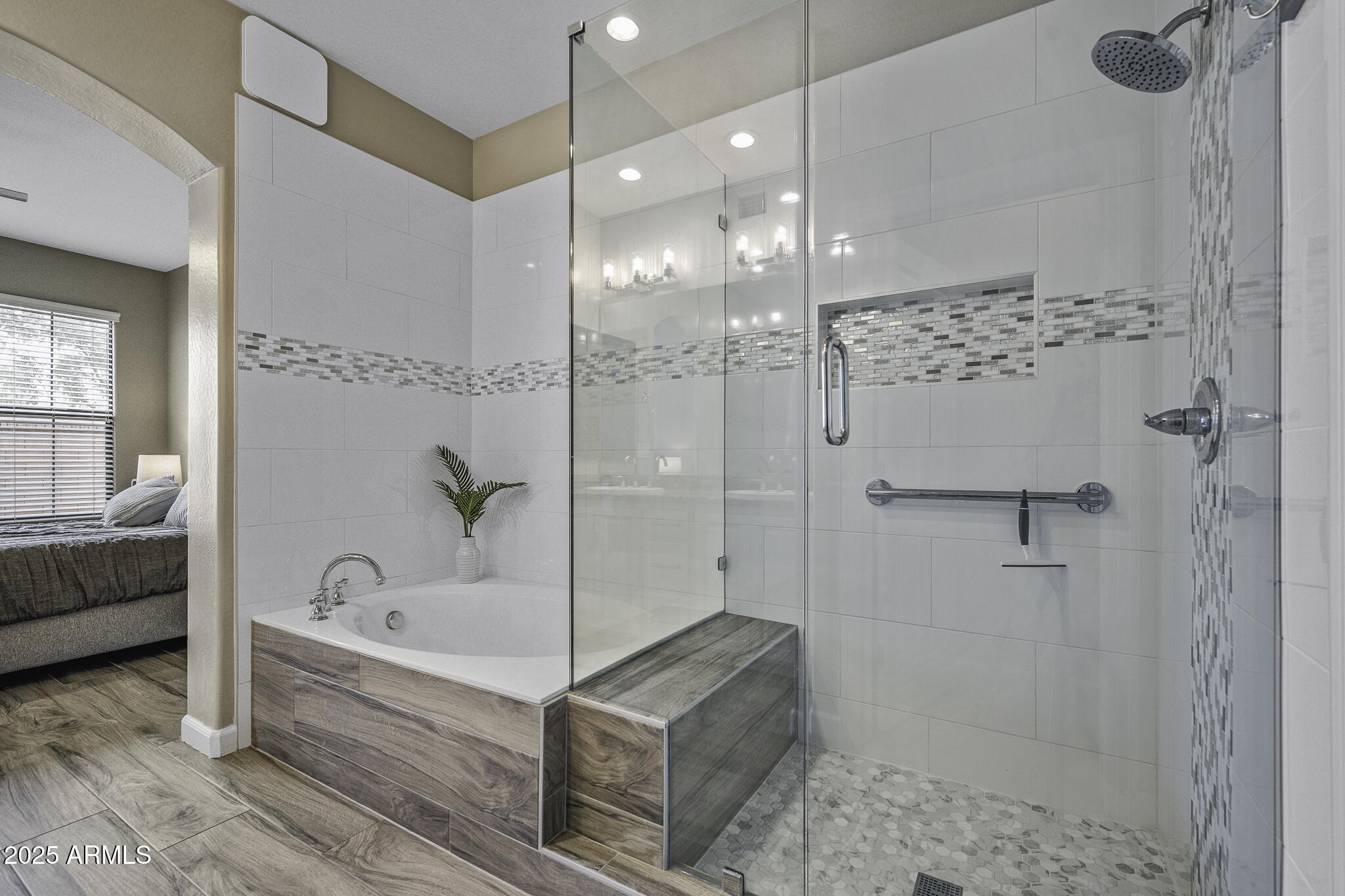 4777 South Fulton Ranch Boulevard, Unit 1044 Chandler, AZ 85248 - Photo 13 of 22 a bathroom with a bathtub and a shower