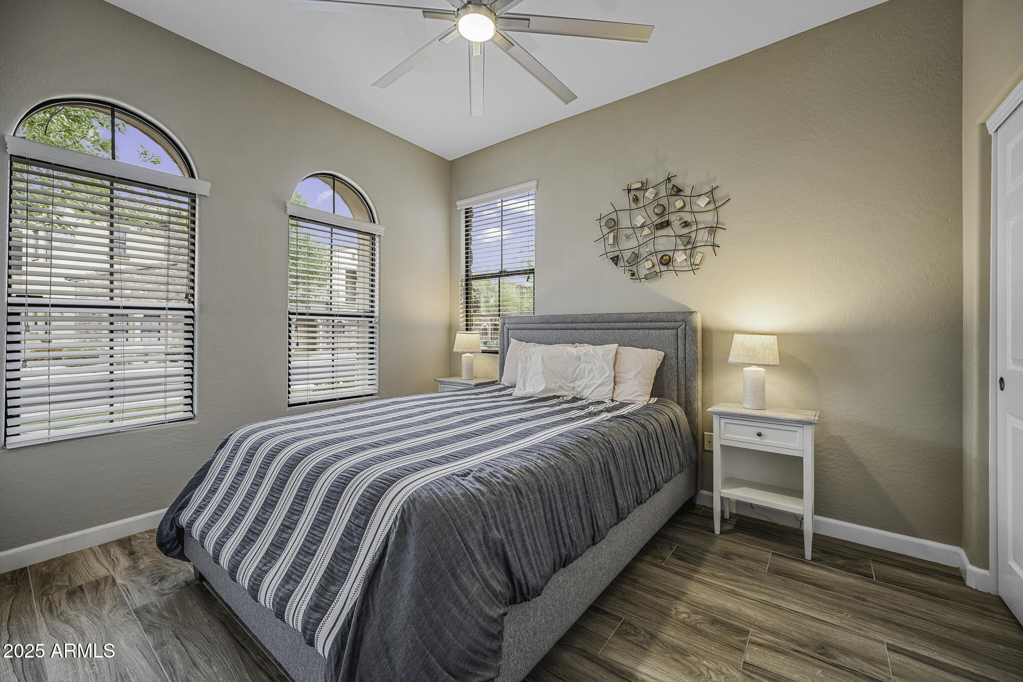 4777 South Fulton Ranch Boulevard, Unit 1044 Chandler, AZ 85248 - Photo 15 of 22 a bedroom with a bed and a window