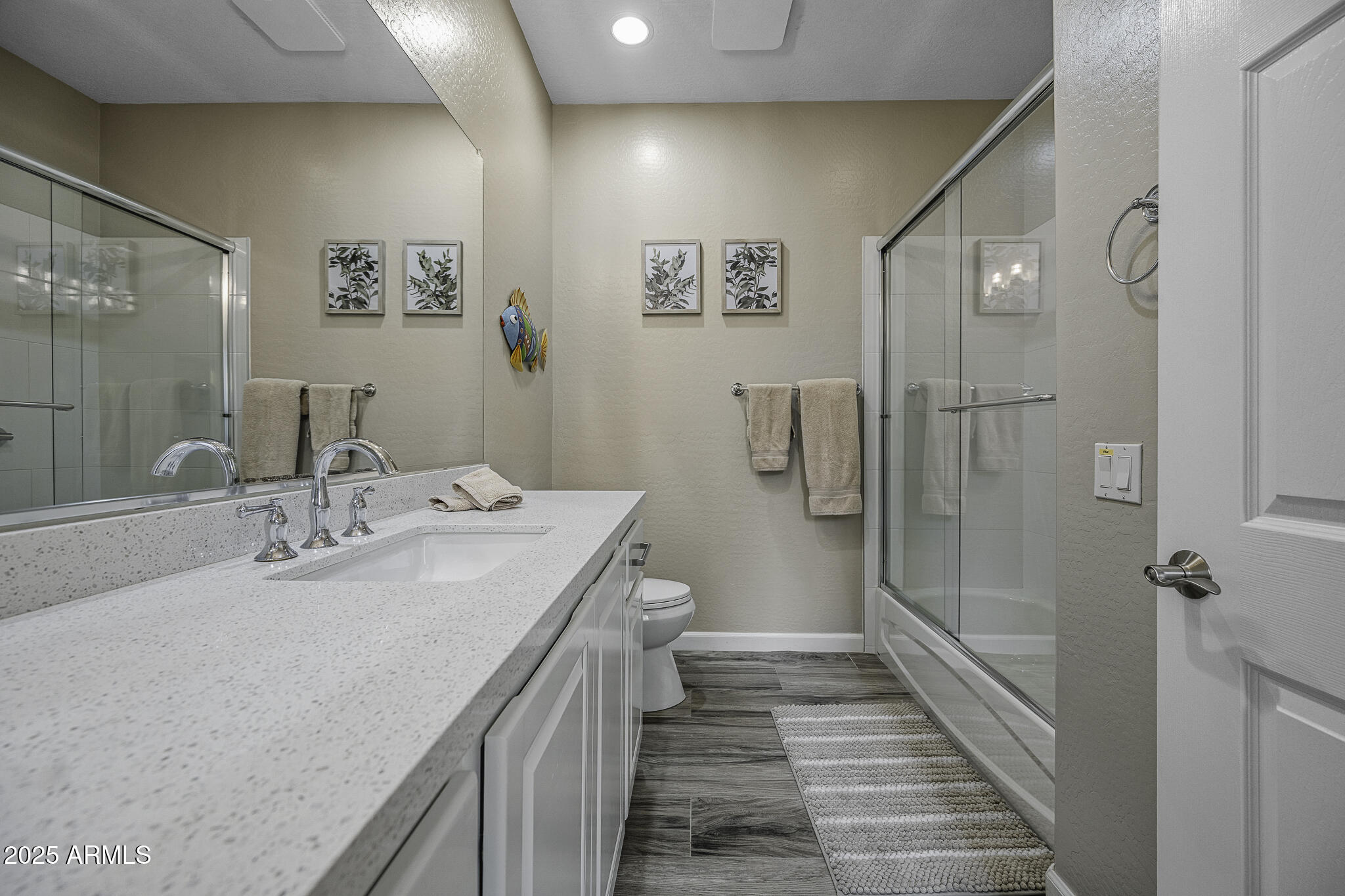 4777 South Fulton Ranch Boulevard, Unit 1044 Chandler, AZ 85248 - Photo 16 of 22 a bathroom with a double vanity sink and a mirror