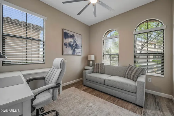 a living room with furniture and a window