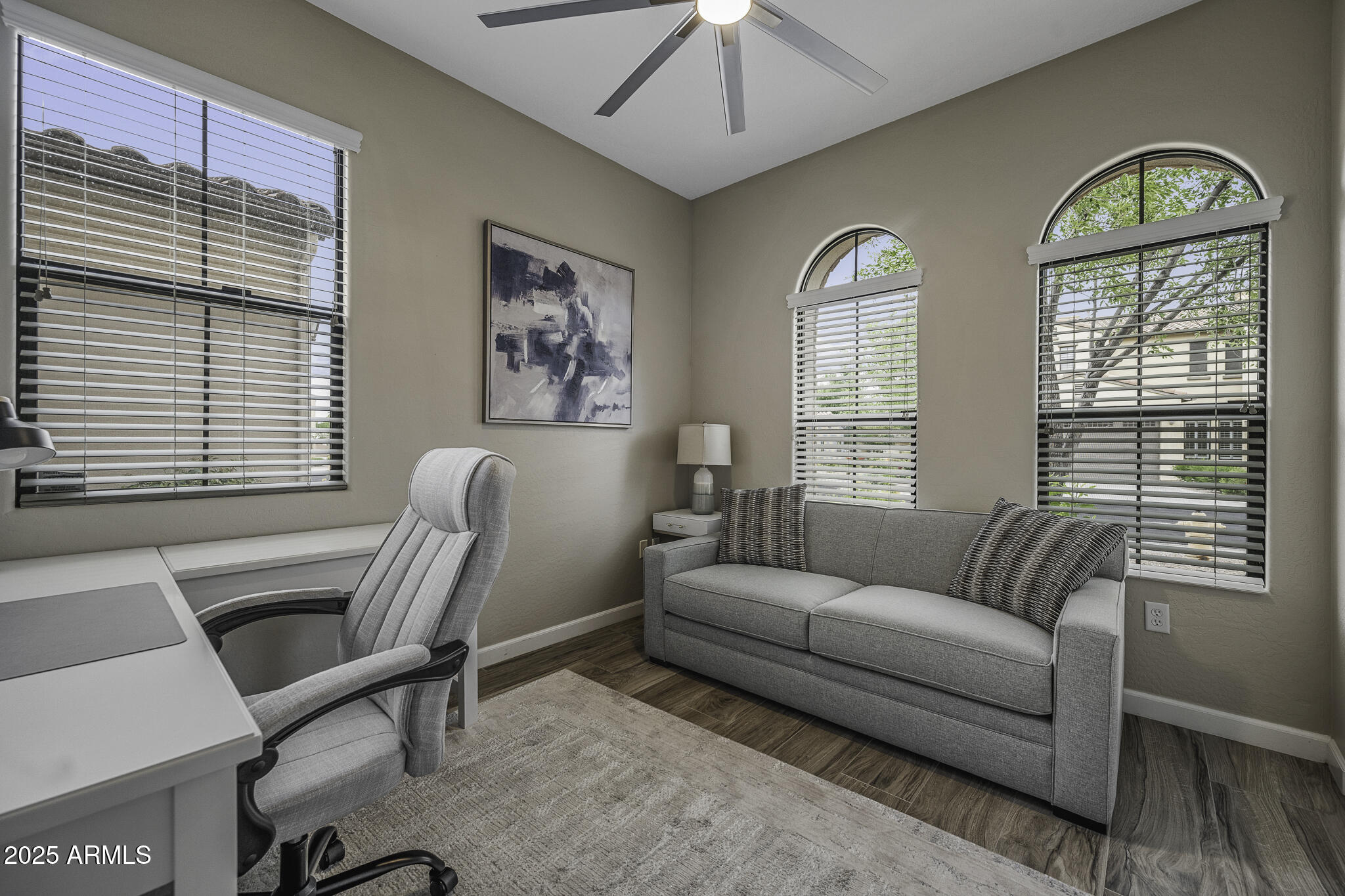 4777 South Fulton Ranch Boulevard, Unit 1044 Chandler, AZ 85248 - Photo 17 of 22 a living room with furniture and a window