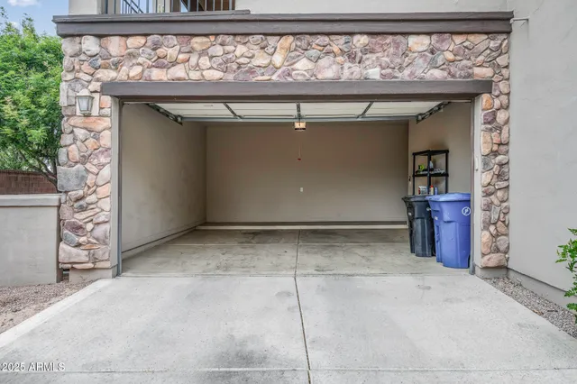 a view of a swimming pool with a table and chairs