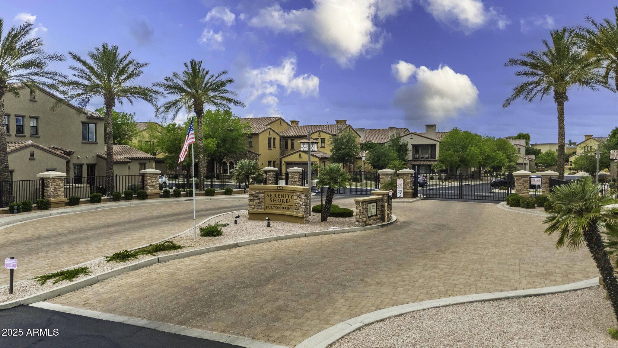 4777 South Fulton Ranch Boulevard, Unit 1044 Chandler, AZ 85248 - Photo 20 of 22 a view of a swimming pool with a table and chairs