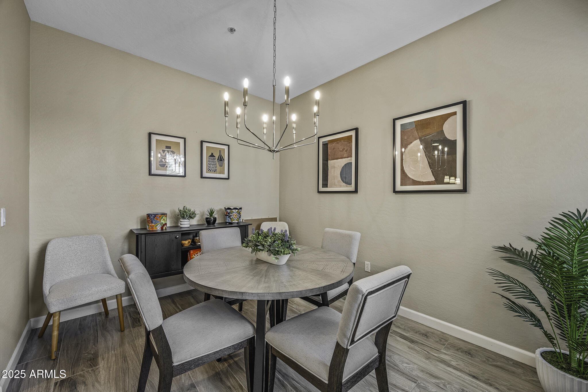 4777 South Fulton Ranch Boulevard, Unit 1044 Chandler, AZ 85248 - Photo 5 of 22 a view of a dining room with furniture and wooden floor