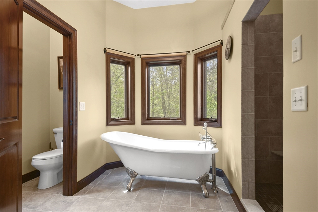 81 Northside Road Charlton, MA 01507 - Photo 23 of 40 a bathroom with a tub and sink