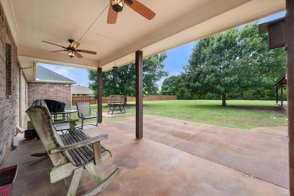 413 Rugged Drive Red Oak, TX 75154 - Photo 26 of 39 Back patio overlooking the yard and shop