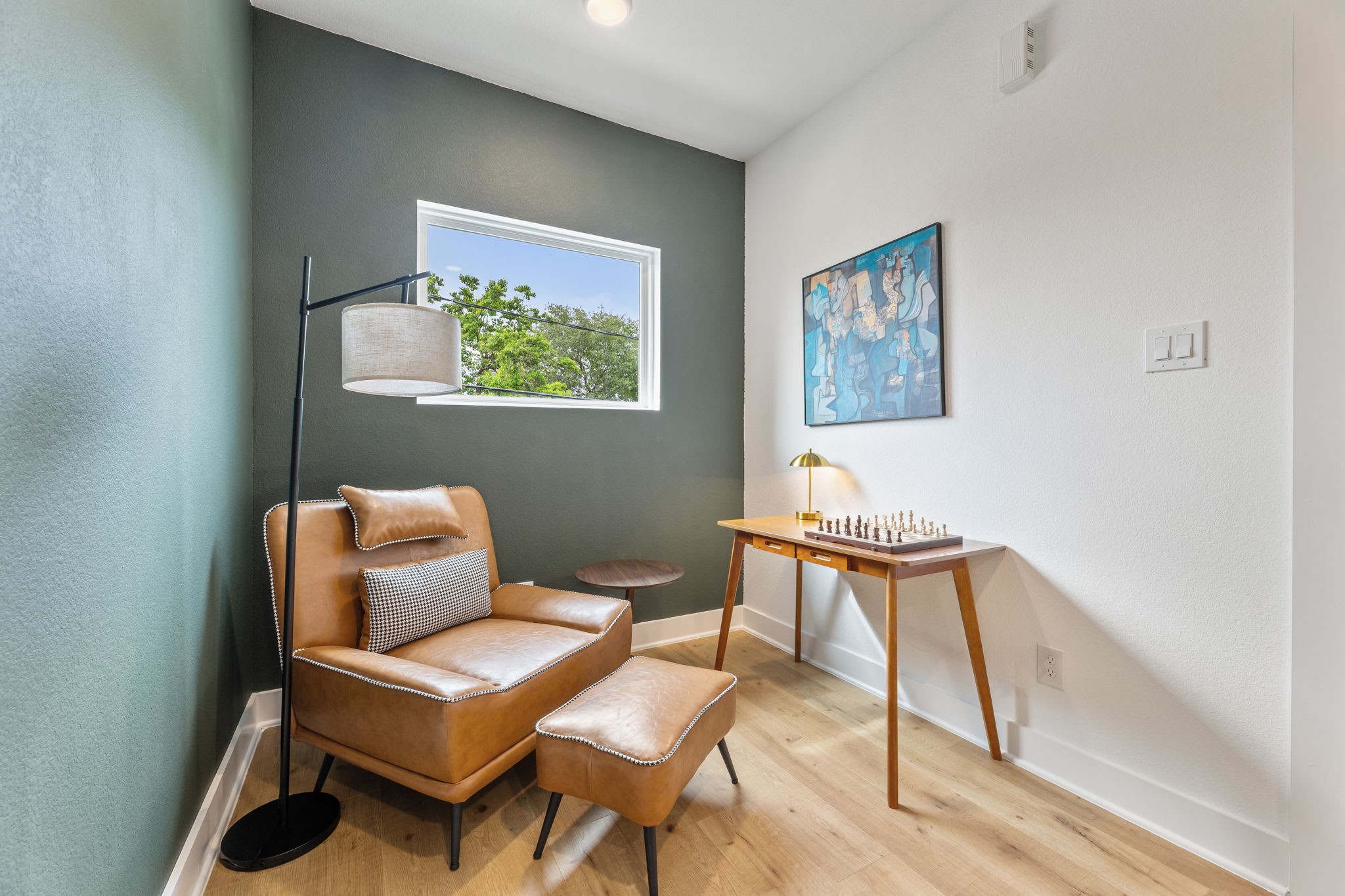 515 Altic Street Houston, TX 77011 - Photo 14 of 36 a view of a livingroom with furniture and wooden floor