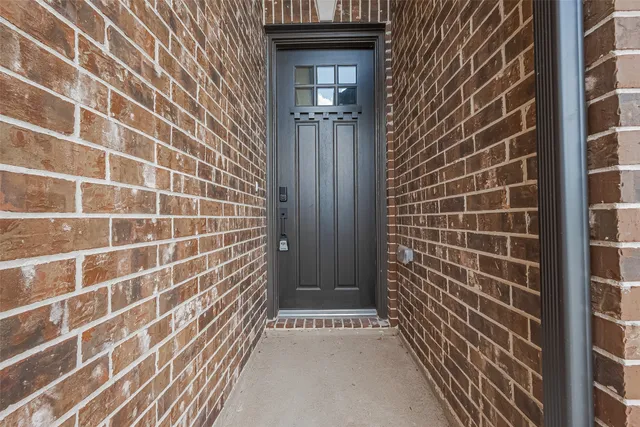 a view of a room with a furniture and wooden floor