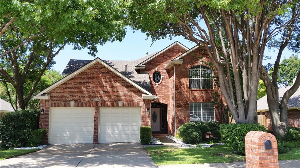 3215 Mission Ridge Drive Flower Mound, TX 75022 - Photo 1 of 1 a front view of a house with a yard and plants