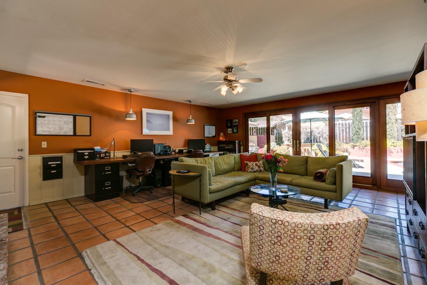918 El Toro Road Ojai, CA 93023 - Photo 14 of 43 a living room with furniture and a flat screen tv