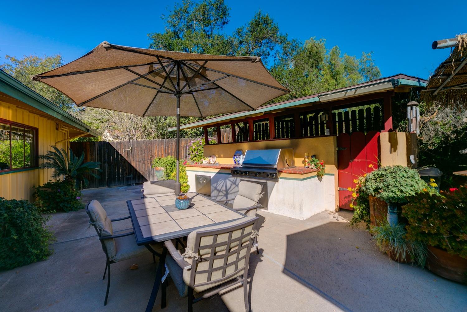 918 El Toro Road Ojai, CA 93023 - Photo 32 of 43 a view of backyard with seating space and wooden fence