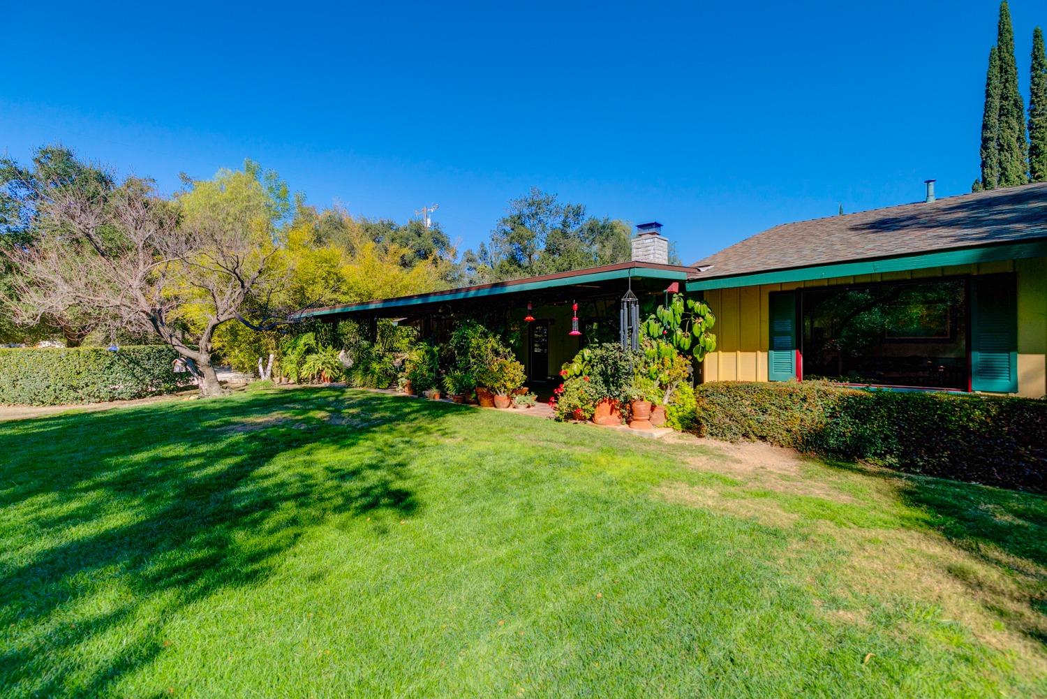 918 El Toro Road Ojai, CA 93023 - Photo 42 of 43 a view of a house with a backyard and a patio