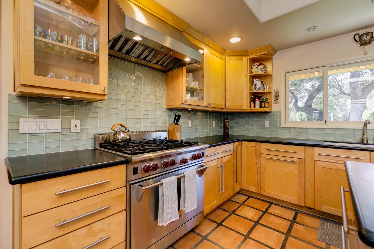 918 El Toro Road Ojai, CA 93023 - Photo 5 of 43 a kitchen with stainless steel appliances granite countertop a stove and a sink