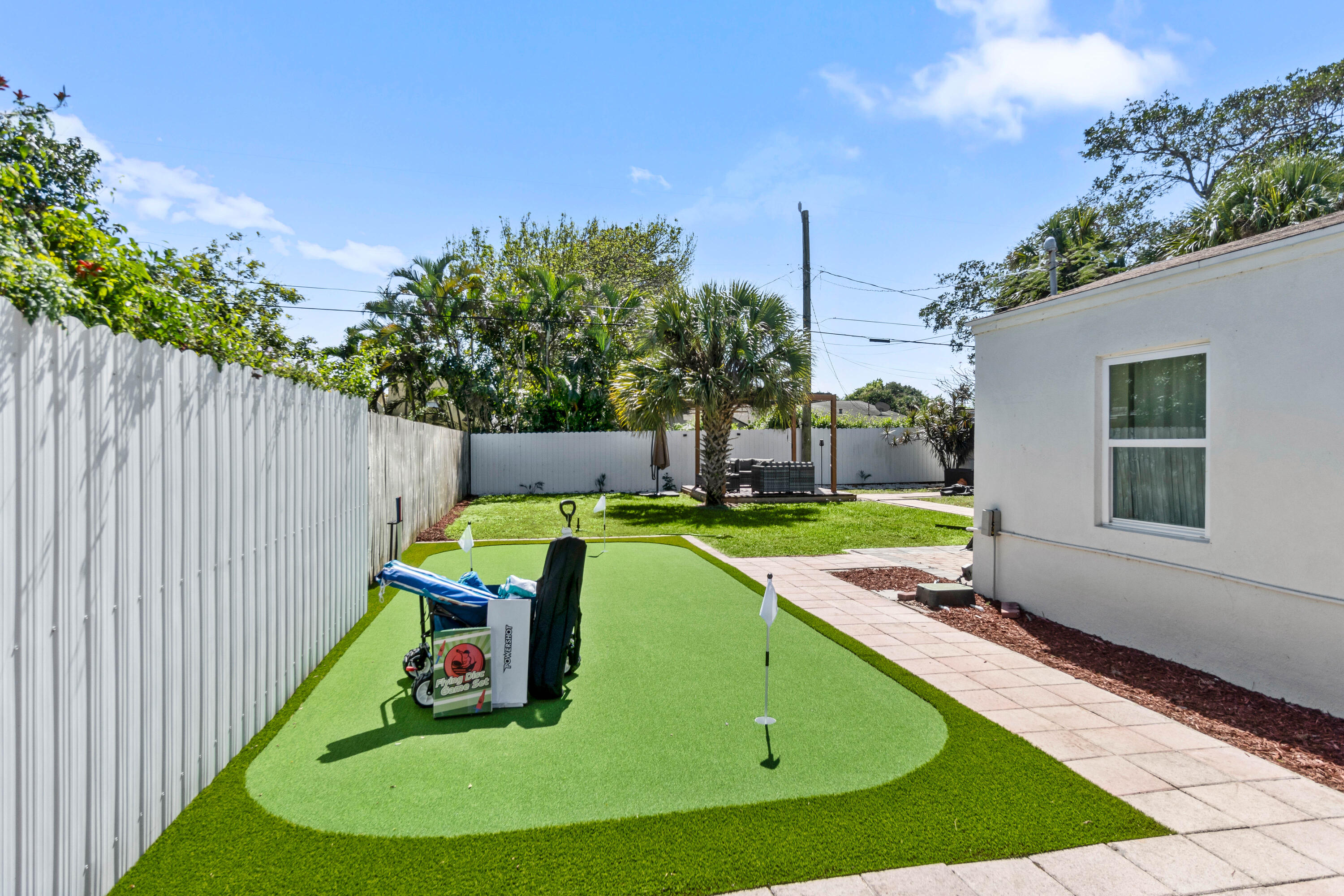 814 Franklin Road West Palm Beach, FL 33405 - Photo 12 of 12 a view of a swimming pool with an outdoor space