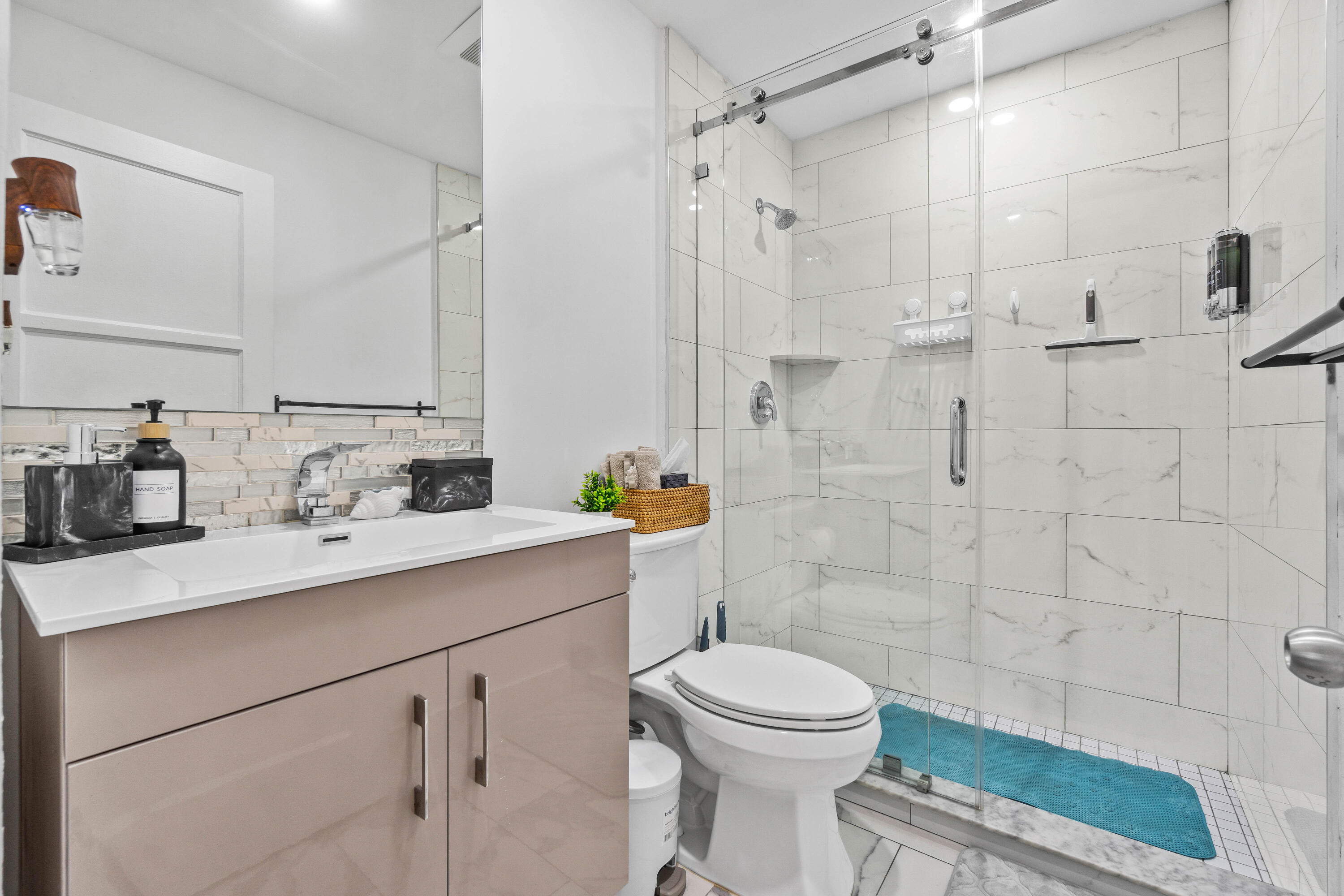 814 Franklin Road West Palm Beach, FL 33405 - Photo 6 of 12 a bathroom with a sink a toilet and shower