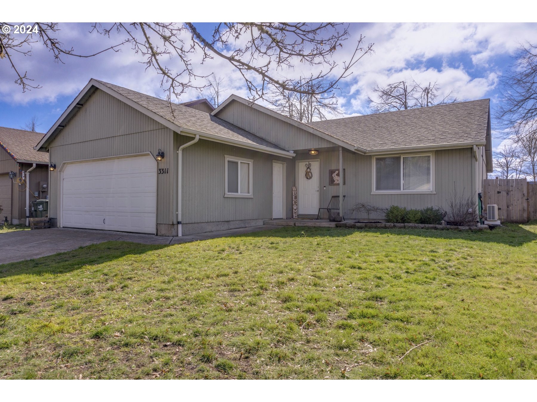 3311 Pinyon Street Springfield, OR 97478 - Photo 1 of 21 a view of a house with a yard