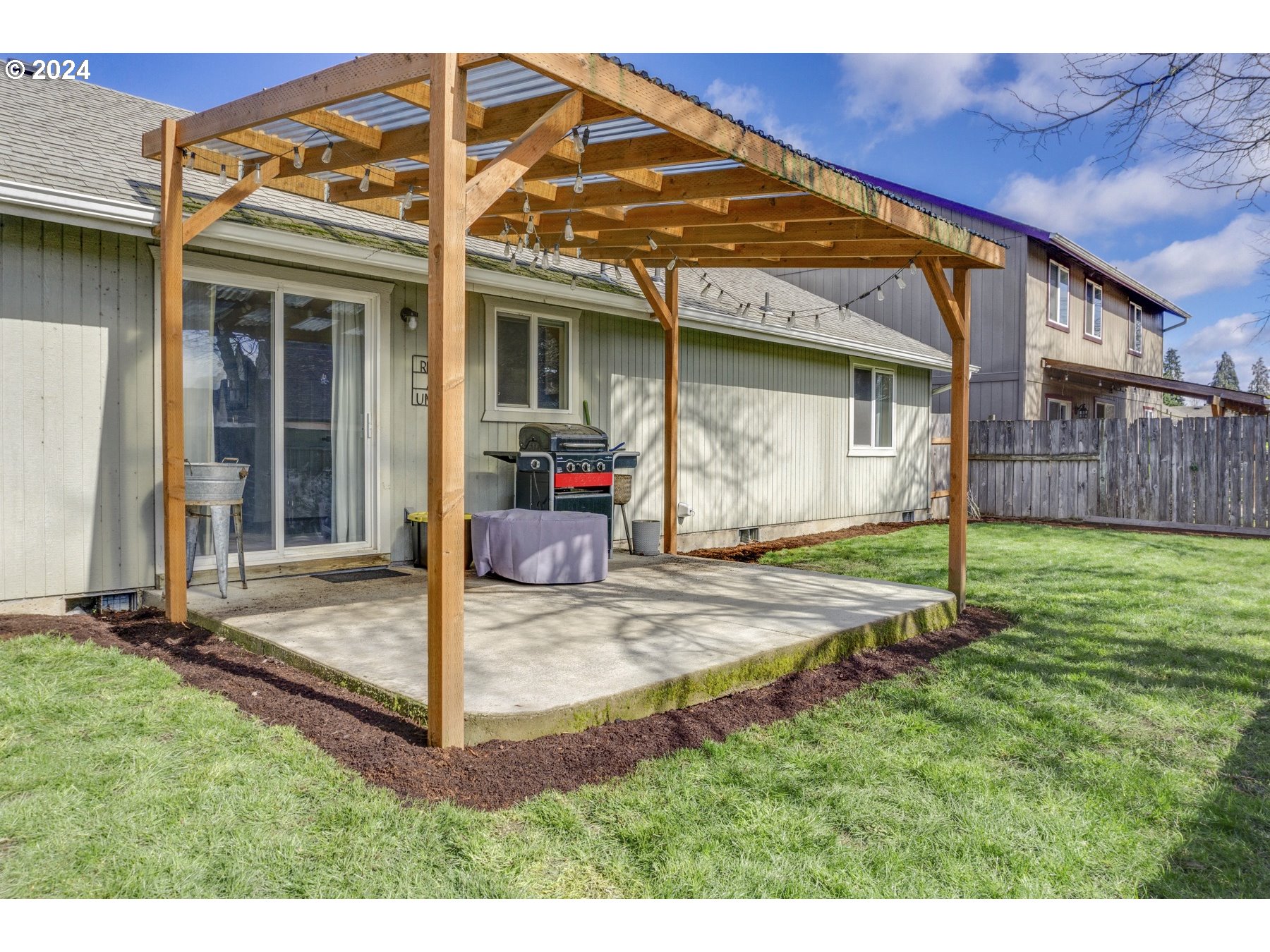 3311 Pinyon Street Springfield, OR 97478 - Photo 19 of 21 a view of a house with backyard and porch