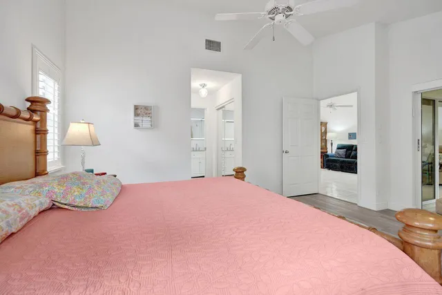 a view of a lake with houses in the back