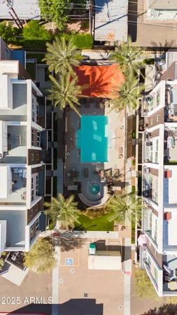 a view of pool with outdoor seating
