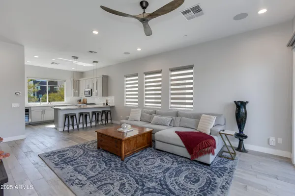 a living room with furniture and a rug
