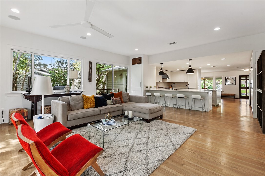 a living room with furniture and a table