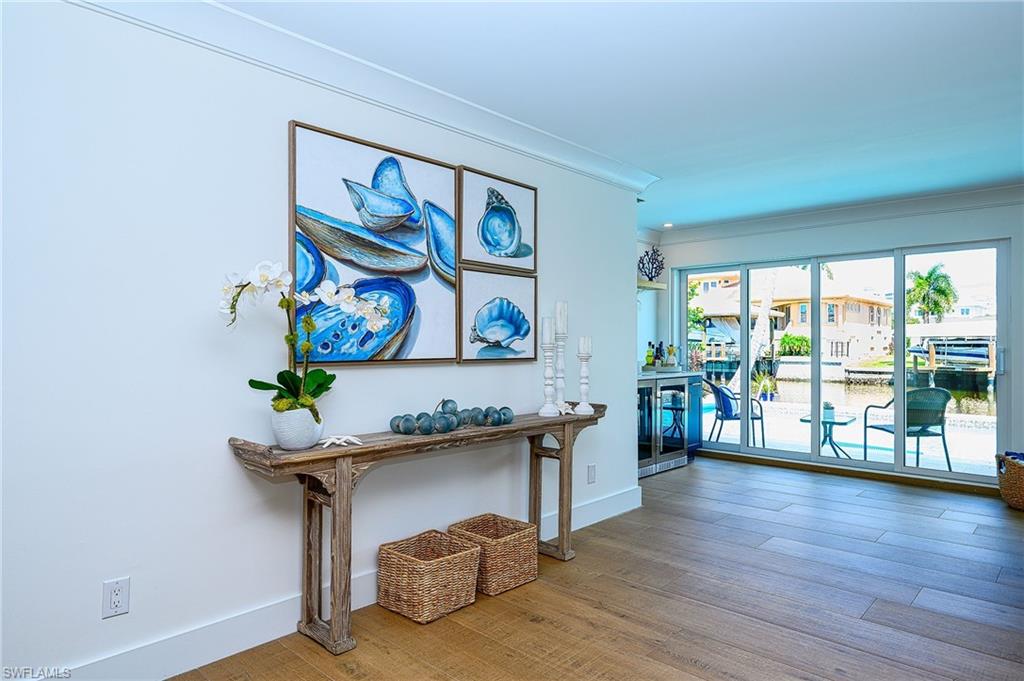 343 Conners Avenue Naples, FL 34108 - Photo 11 of 34 a workspace with furniture and window