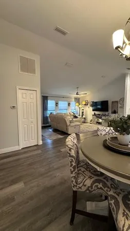 a room with furniture and a wooden floor