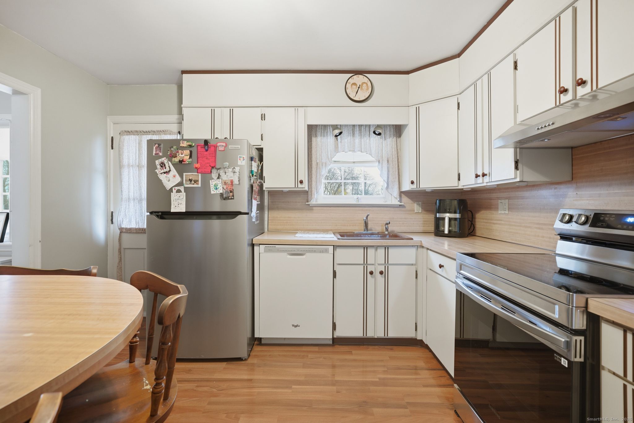 23 Baldwin Street Meriden, CT 06451 - Photo 14 of 40 a kitchen with granite countertop a sink appliances cabinets and counter space
