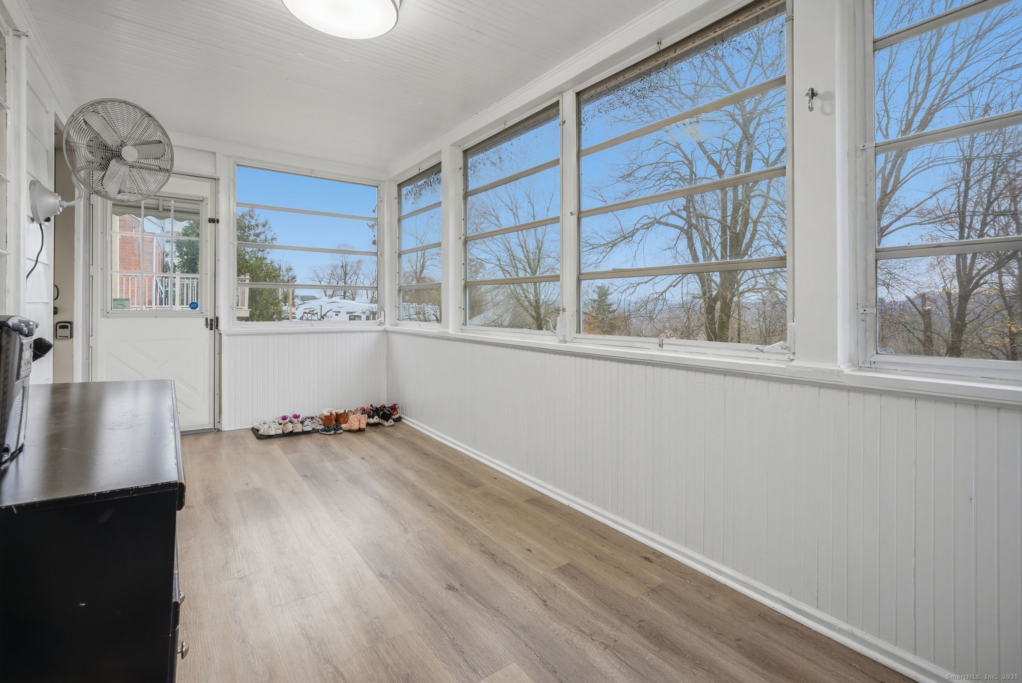 23 Baldwin Street Meriden, CT 06451 - Photo 16 of 40 wooden floor in an empty room with a window