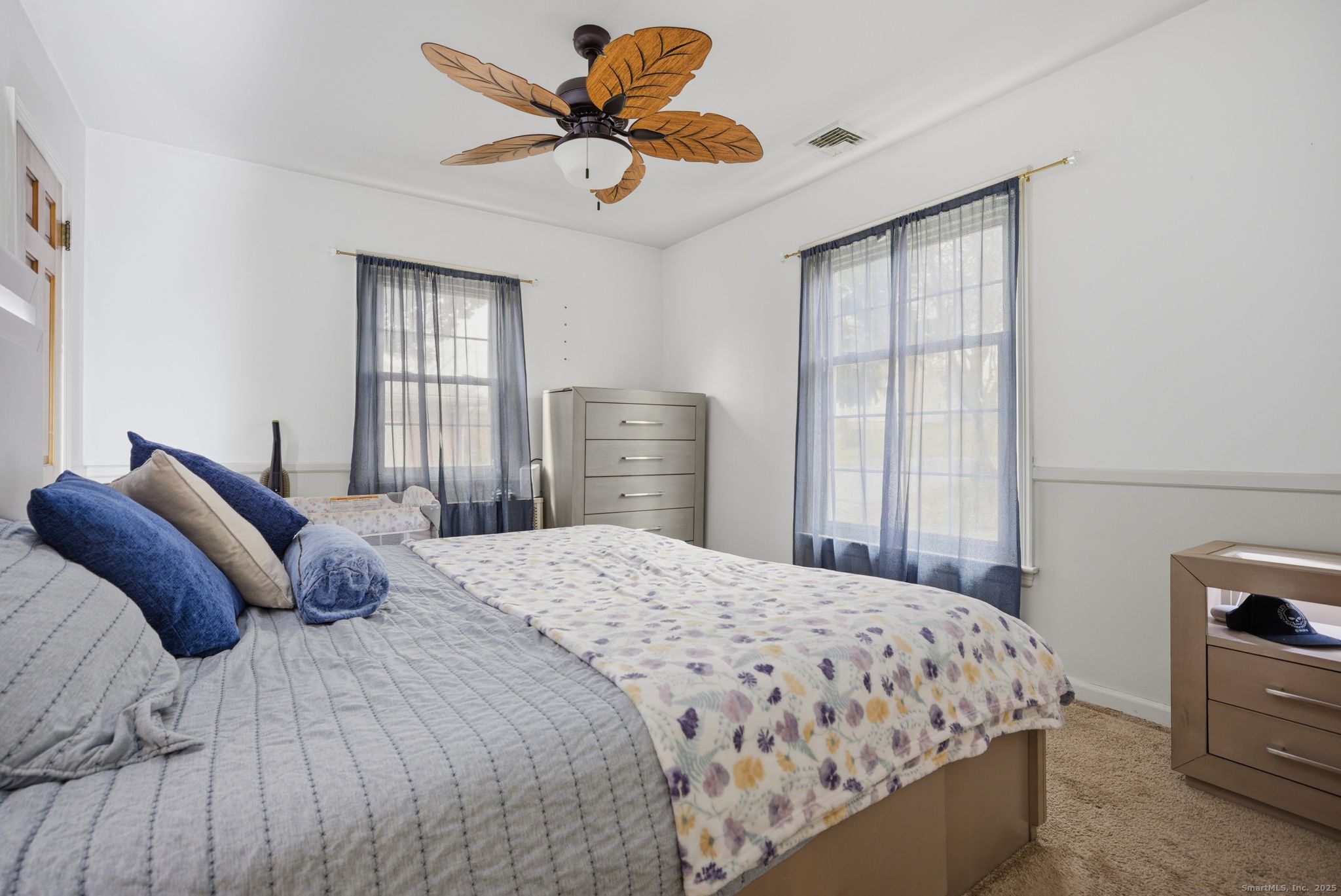 23 Baldwin Street Meriden, CT 06451 - Photo 18 of 40 a bedroom with a bed and dresser