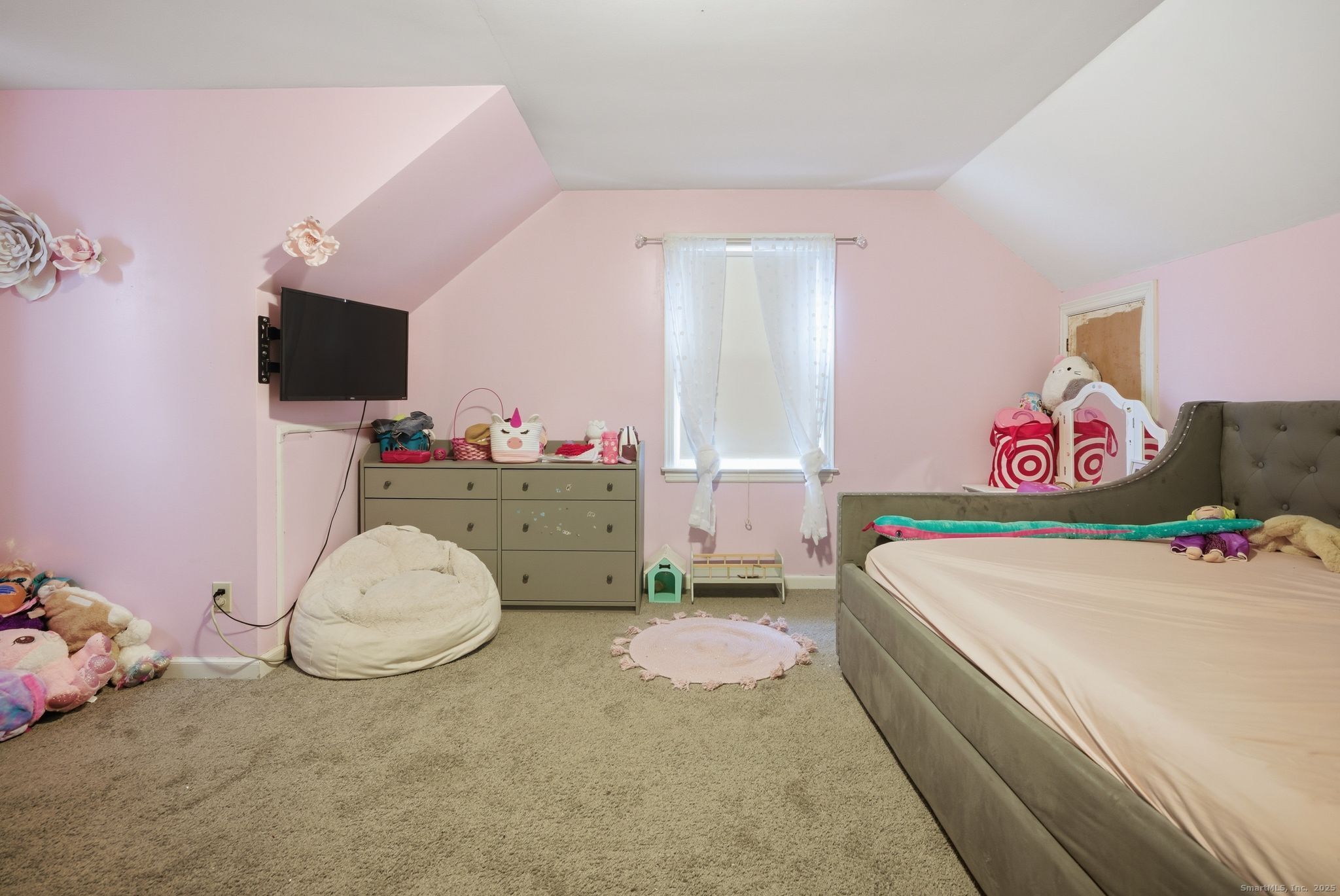 23 Baldwin Street Meriden, CT 06451 - Photo 27 of 40 a bedroom with a bed and flat screen tv