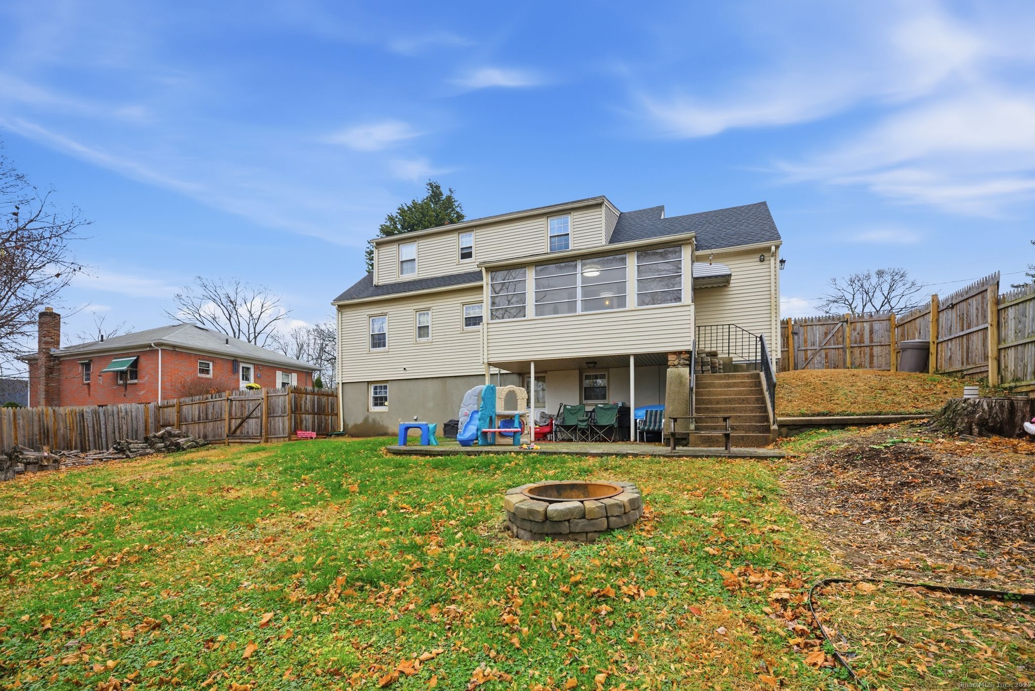 23 Baldwin Street Meriden, CT 06451 - Photo 40 of 40 a view of a house with a big yard and large trees