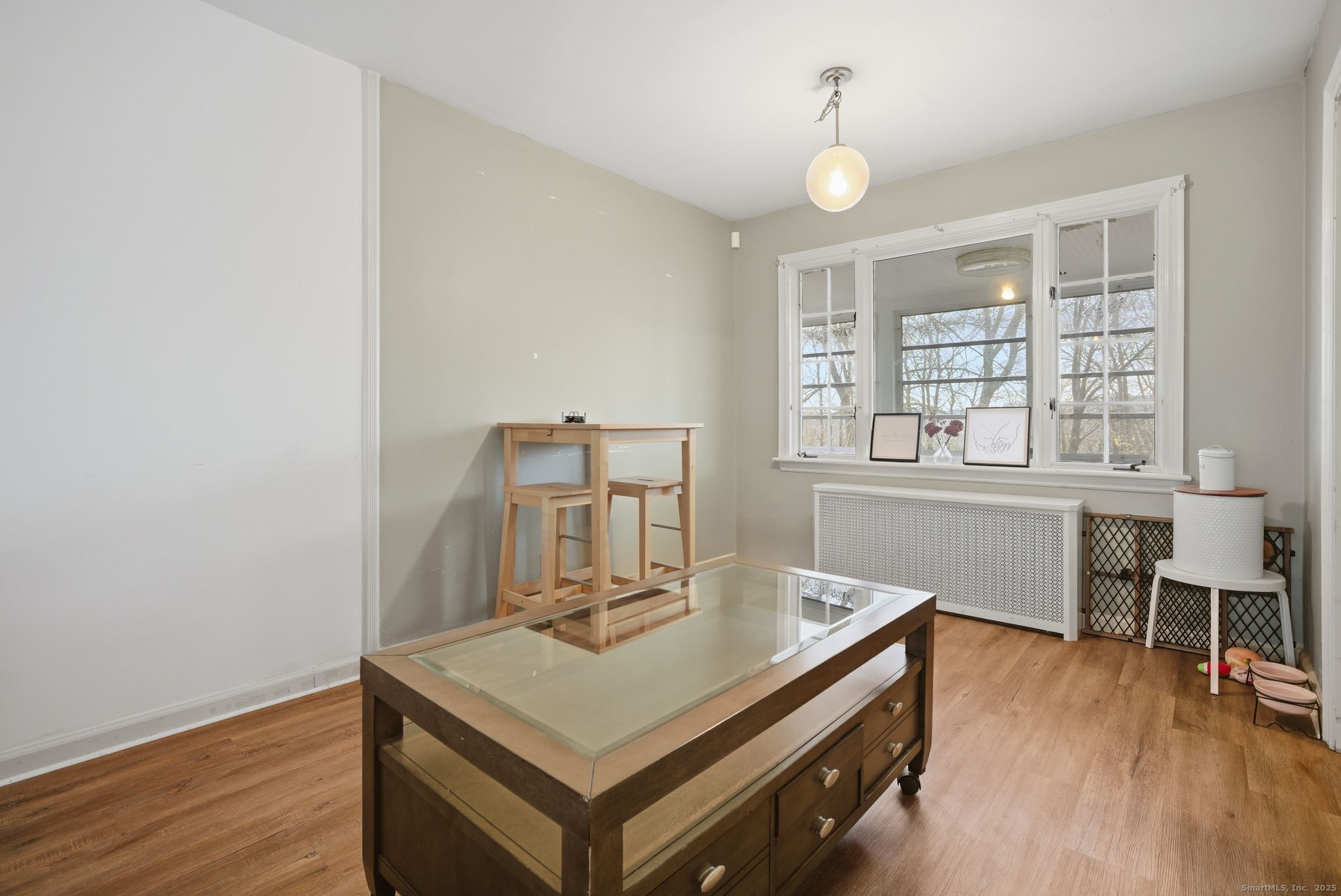 23 Baldwin Street Meriden, CT 06451 - Photo 10 of 40 a view of a workspace with furniture and wooden floor