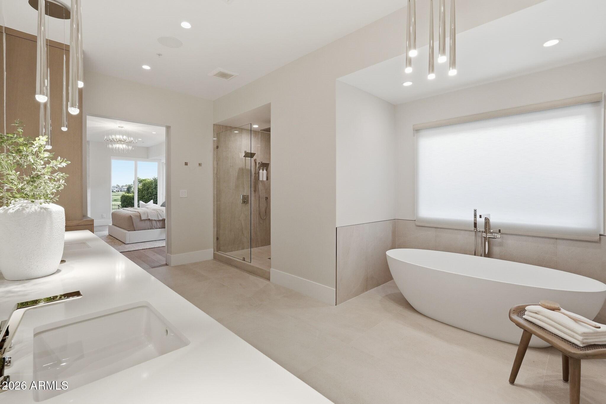 7475 East Gainey Ranch Road, Unit 7 Scottsdale, AZ 85258 - Photo 35 of 77 035_Primary Ensuite