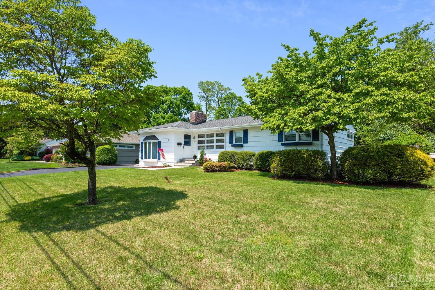 76 Orchard Road Middlesex, NJ 08846 - Photo 1 of 31 a front view of house with yard and green space