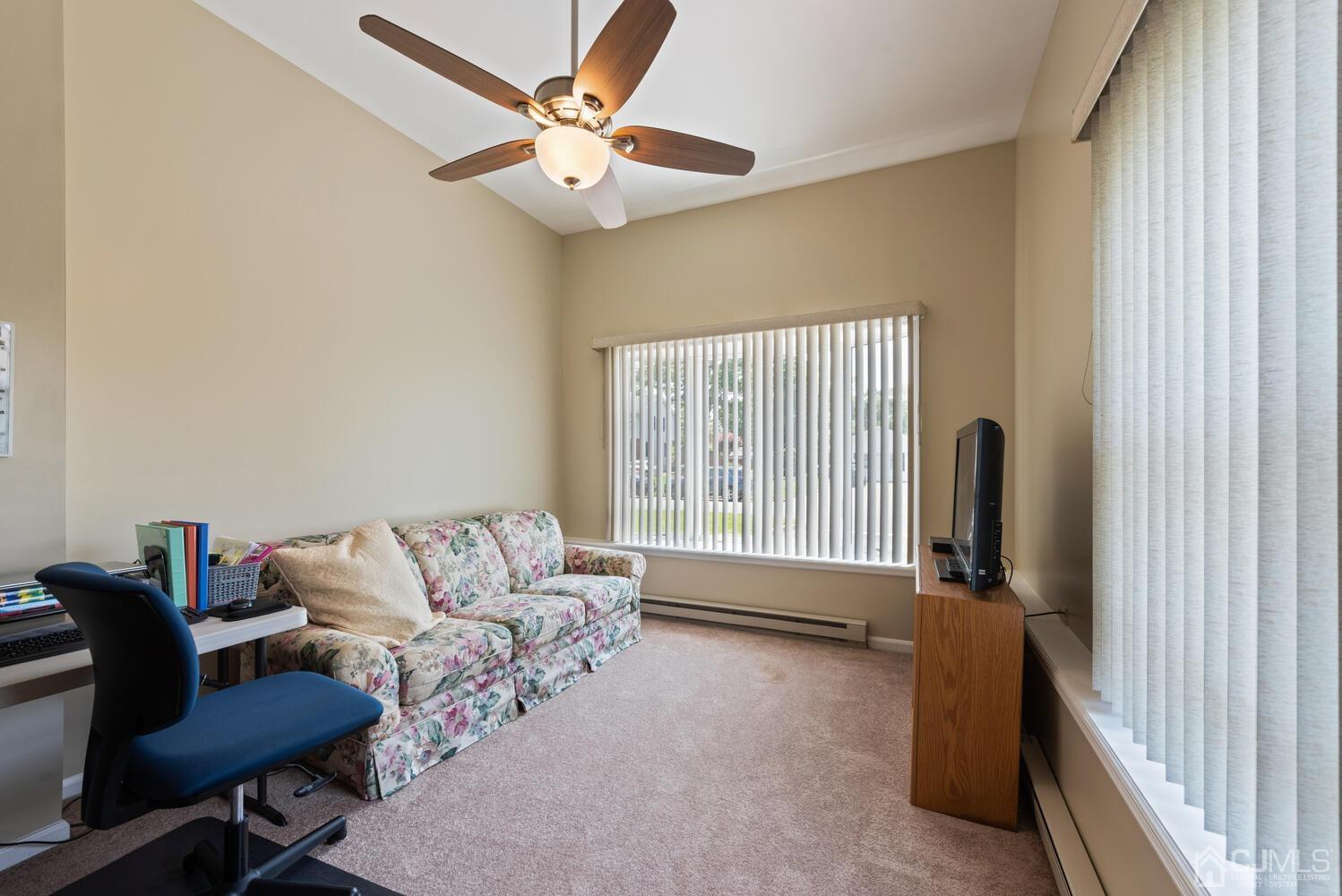 76 Orchard Road Middlesex, NJ 08846 - Photo 13 of 31 a living room with furniture and a window