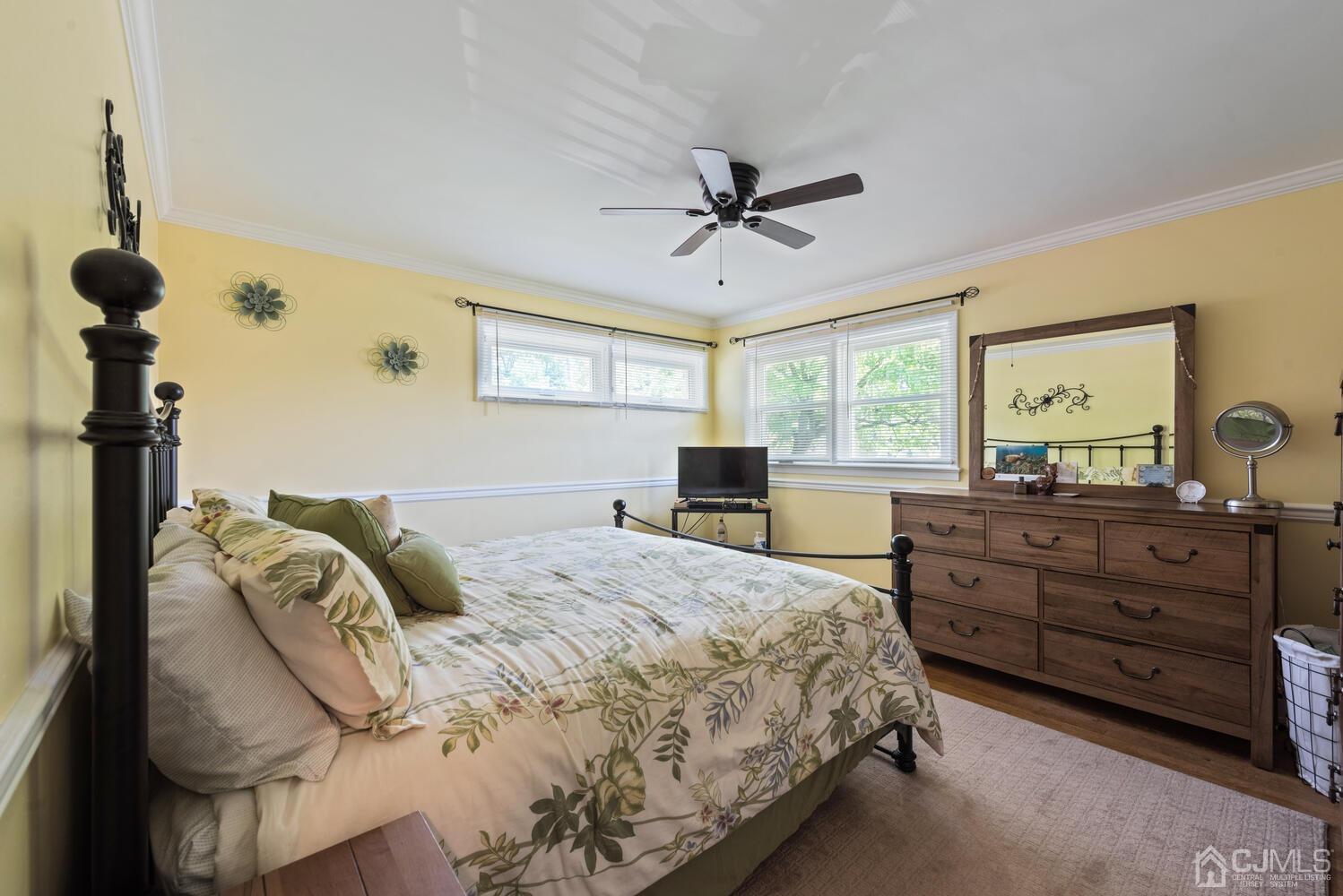 76 Orchard Road Middlesex, NJ 08846 - Photo 15 of 31 a bedroom with a bed and a dresser