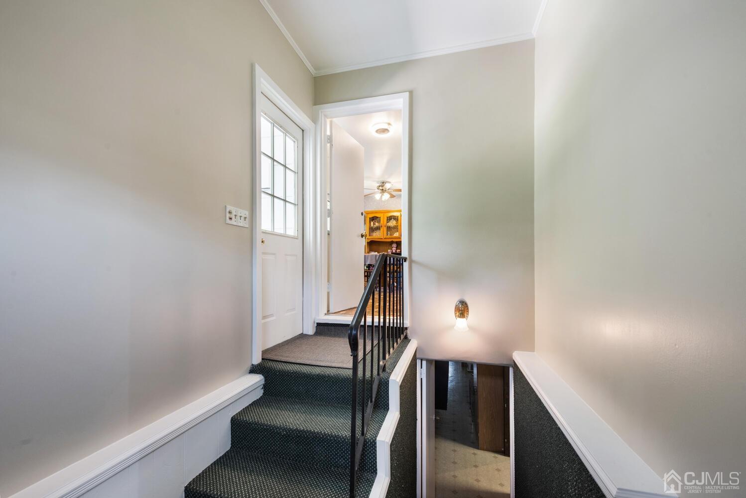 76 Orchard Road Middlesex, NJ 08846 - Photo 18 of 31 a view of entryway with a workspace