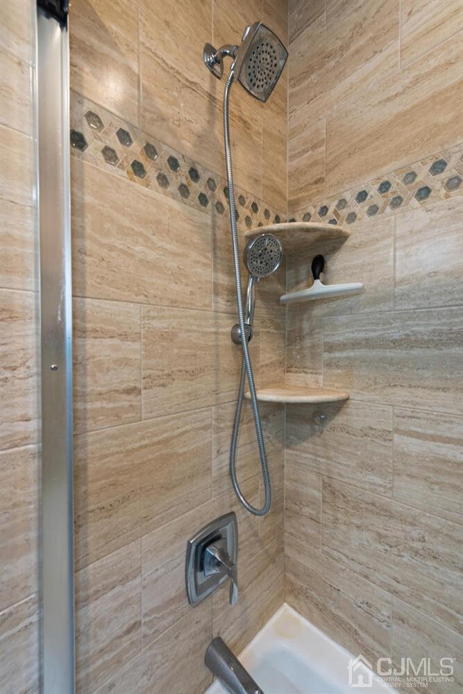 76 Orchard Road Middlesex, NJ 08846 - Photo 20 of 31 a bathroom with a shower