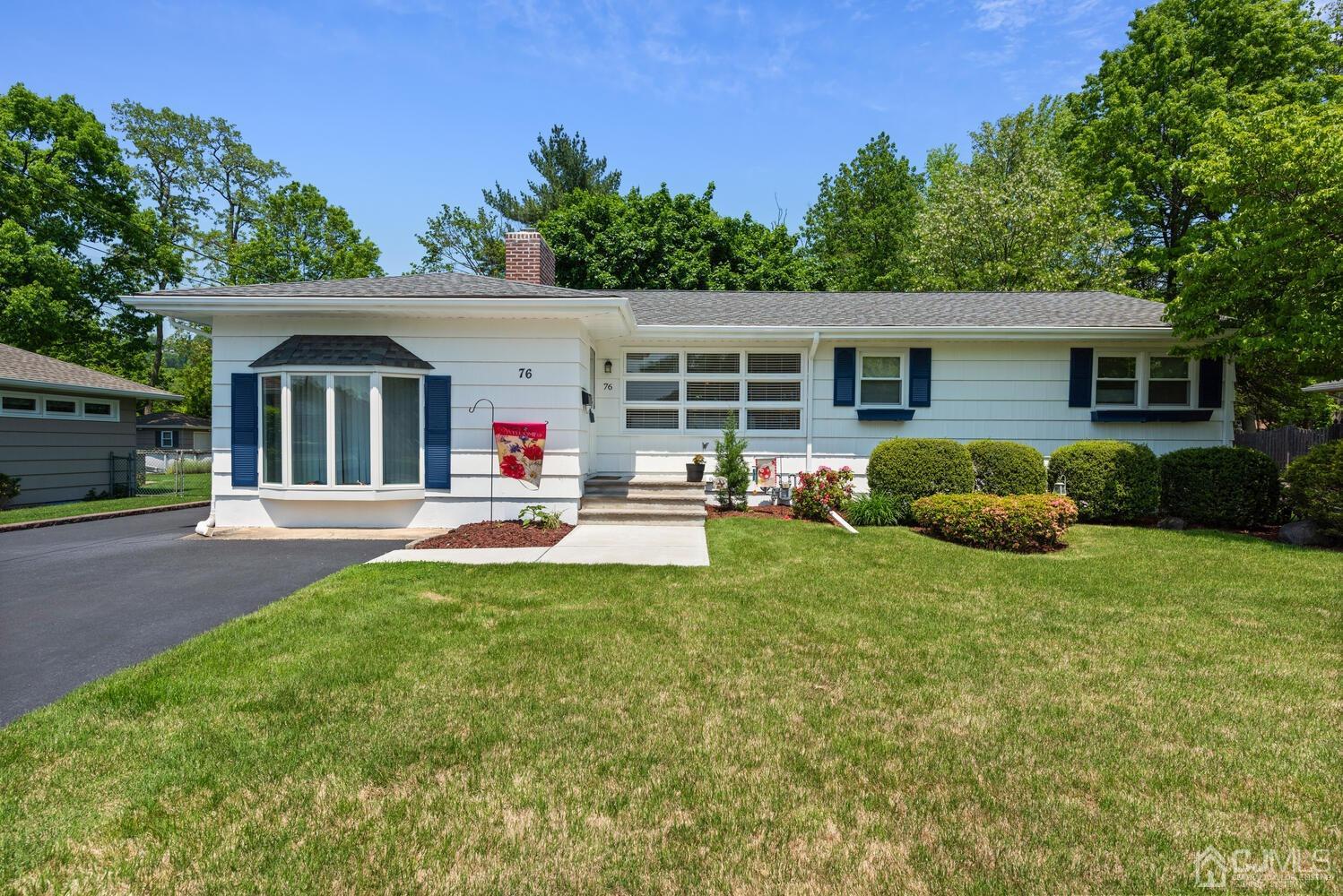 76 Orchard Road Middlesex, NJ 08846 - Photo 2 of 31 a view of a house with backyard and a tree