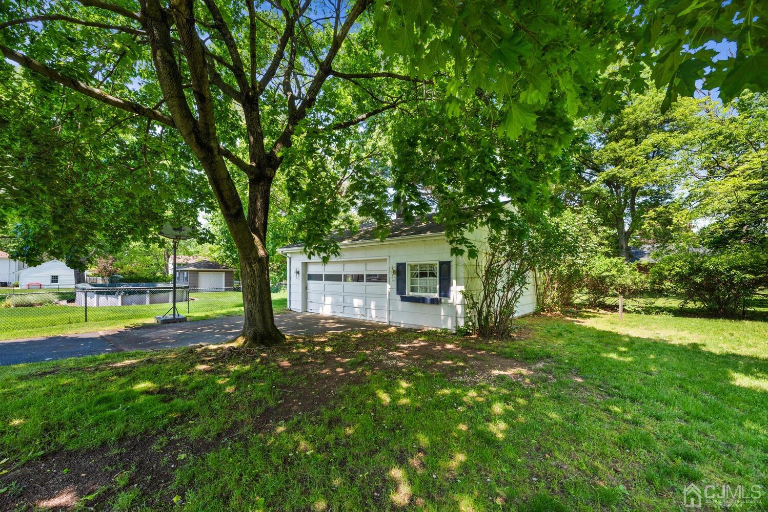 76 Orchard Road Middlesex, NJ 08846 - Photo 24 of 31 a view of a house with a backyard