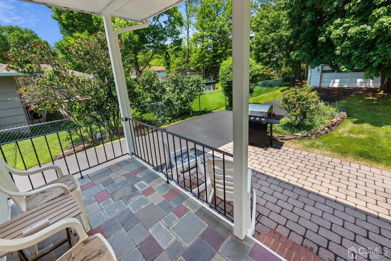 76 Orchard Road Middlesex, NJ 08846 - Photo 25 of 31 a view of a porch and garden
