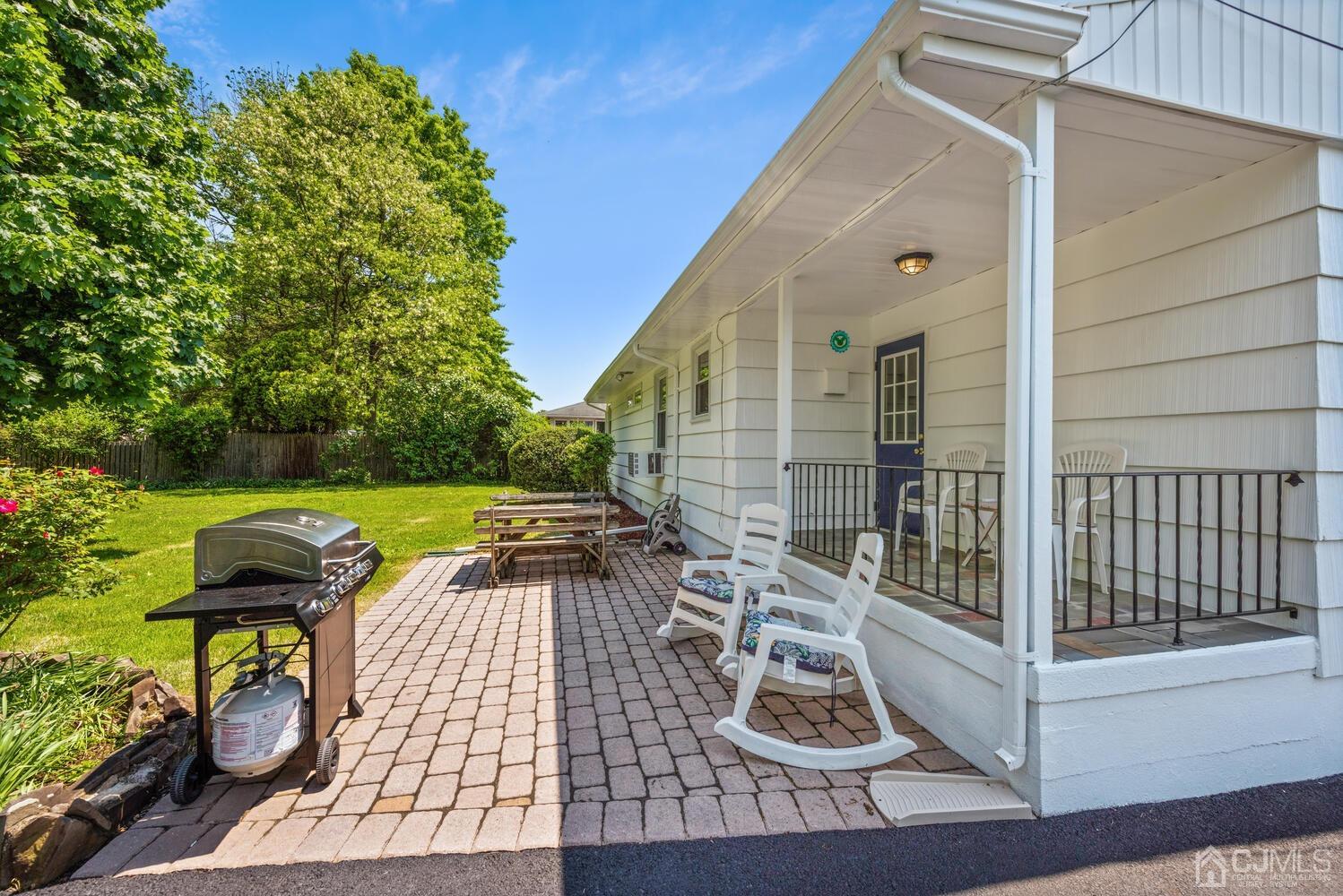 76 Orchard Road Middlesex, NJ 08846 - Photo 26 of 31 a view of a chairs and table on the patio