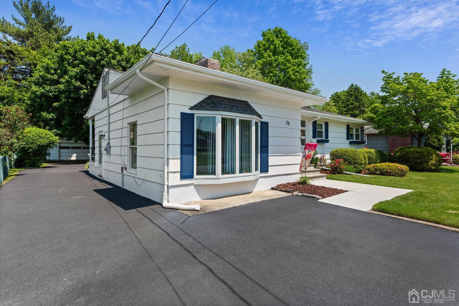 76 Orchard Road Middlesex, NJ 08846 - Photo 3 of 31 a view of a house with backyard and garden