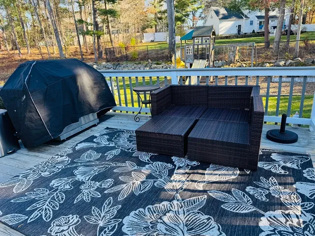 a view of balcony with two chairs and a table