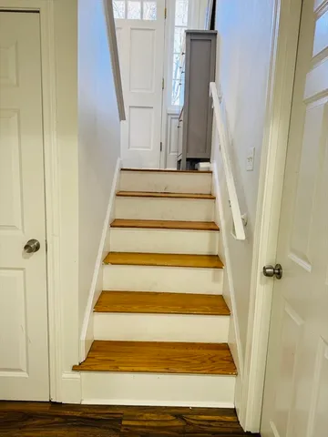 a bedroom with furniture and a bed