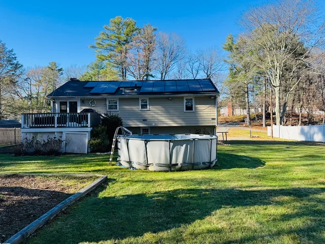 a view of a house with a big yard